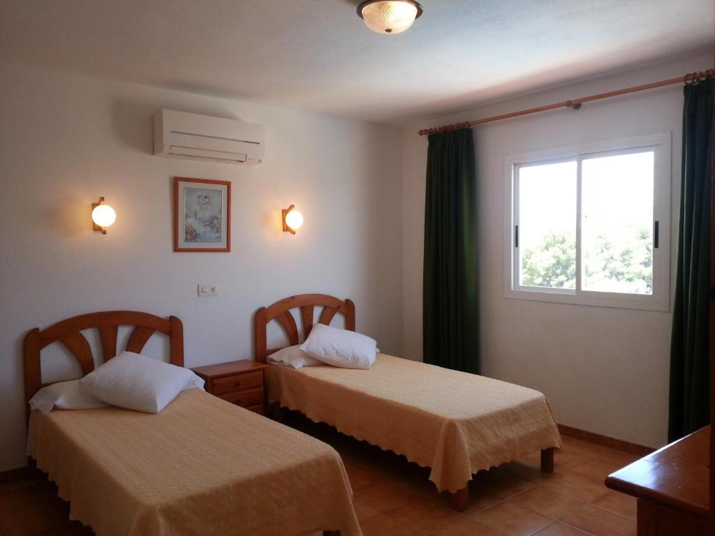 Apartamentos Vista Al Puerto Σαν Αντόνιο Δωμάτιο φωτογραφία
