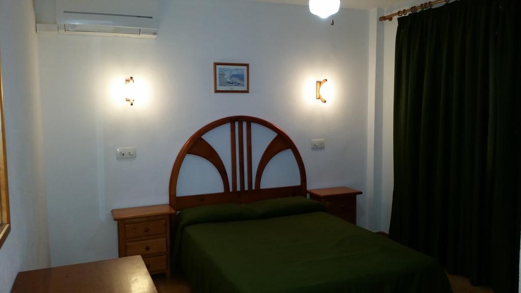 Apartamentos Vista Al Puerto Σαν Αντόνιο Δωμάτιο φωτογραφία